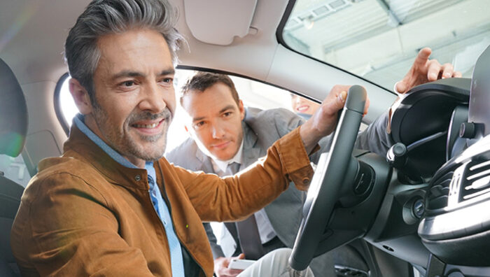 Photo of Man in New Car