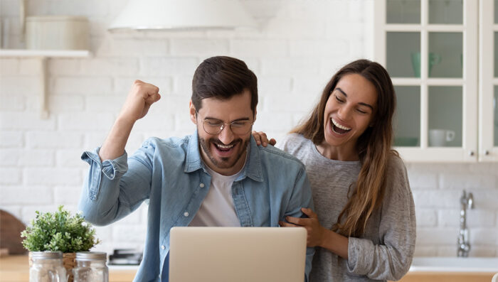 Photo of Couple at Computer